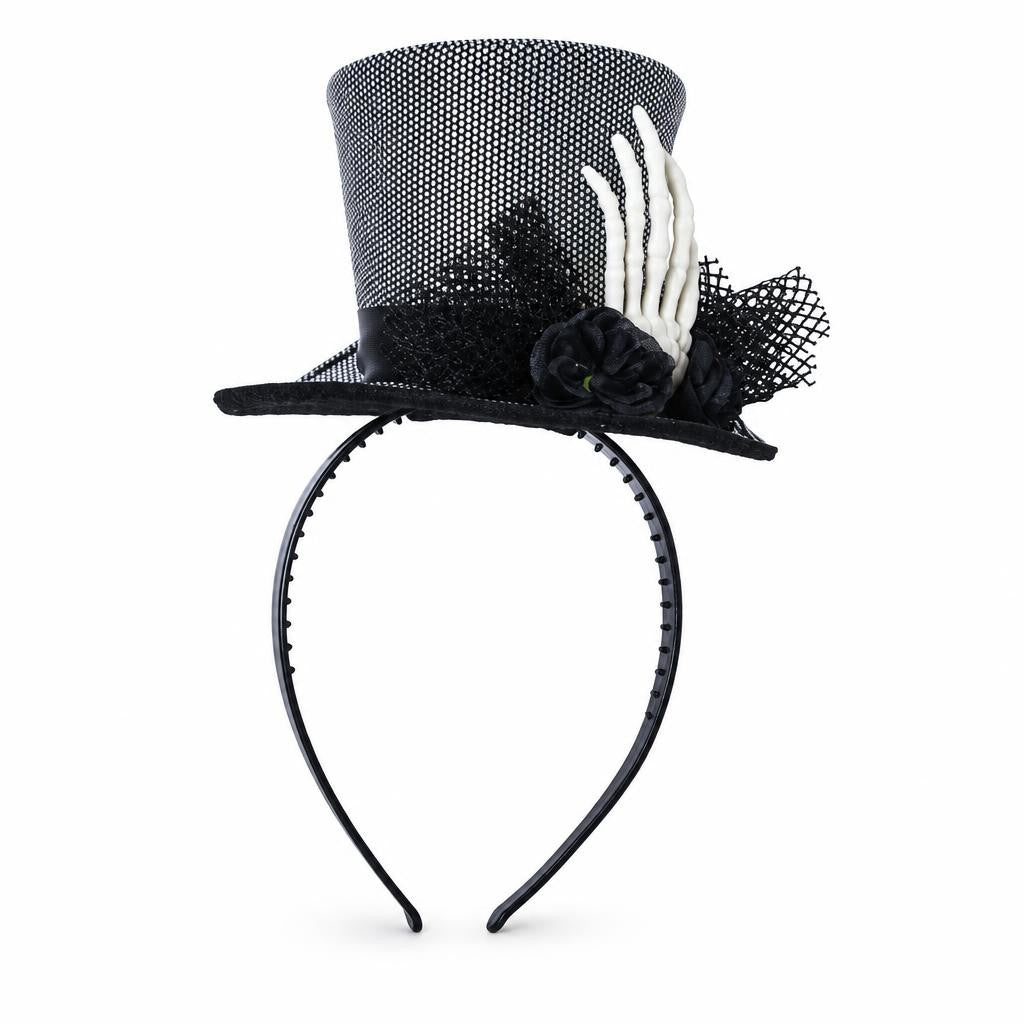 Diadema con mini sombrero de copa y mano de esqueleto sobre fondo blanco
